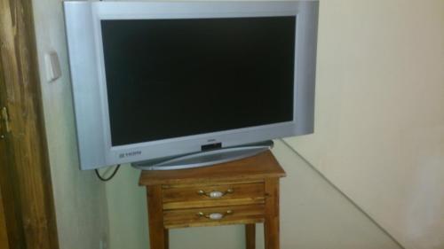 Телевизор и/или развлекательный центр в Hotel Rural Grado del Pico
