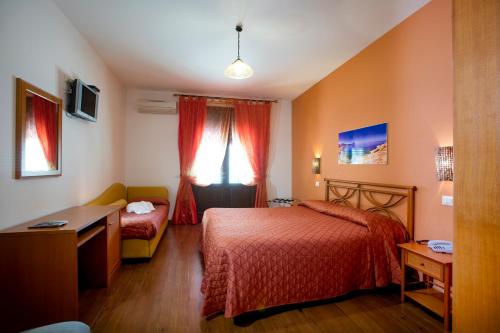 Ένα ή περισσότερα κρεβάτια σε δωμάτιο στο Agave Superior Rooms