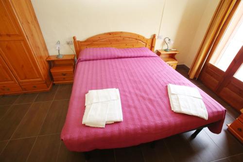 Cama o camas de una habitación en Hotel Paola