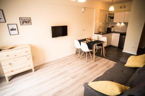 Η κουζίνα ή μικρή κουζίνα στο Apartamenty Opal