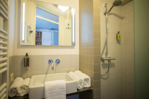 Ванная комната в Appartementenhotel Tjermelân Terschelling
