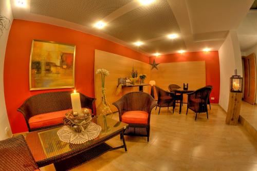 a living room with a couch and a table at Haus Anemone in Serfaus