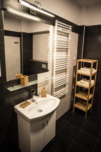 Ένα μπάνιο στο Apartamenty Opal