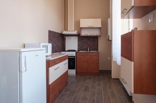 Η κουζίνα ή μικρή κουζίνα στο Csanabella House