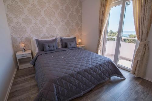 Postel nebo postele na pokoji v ubytování Villa Petra Apartment with private pool