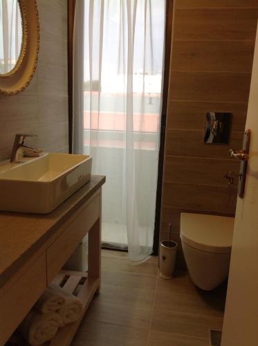 Koupelna v ubytování Apartments Aliki