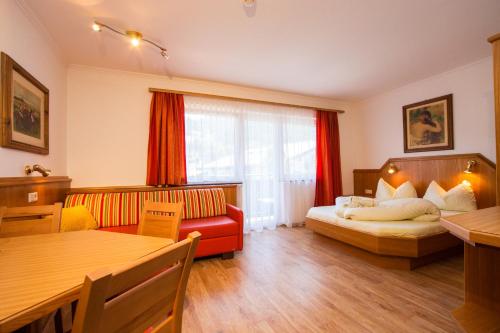 Katil atau katil-katil dalam bilik di Apparthotel Panorama
