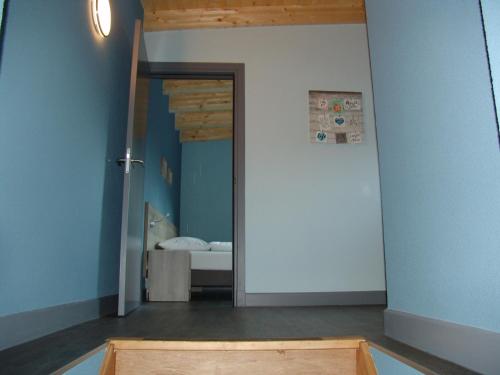 a room with a door leading to a bedroom at Brabander Alm in Biberwier