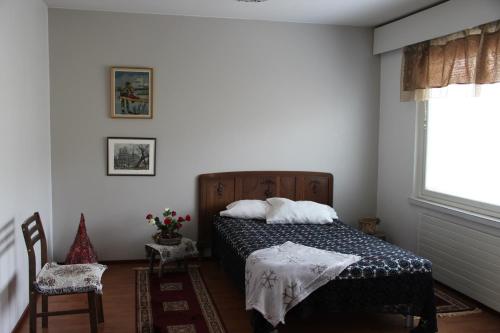 Posteľ alebo postele v izbe v ubytovaní Vanhan Meijerin Majatalo Apartment