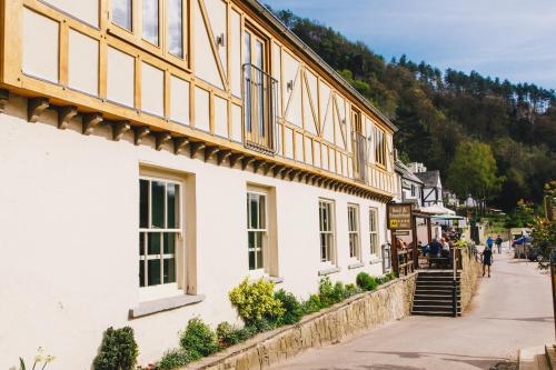 a building on the side of a street at The Saracens Head Inn in Symonds Yat