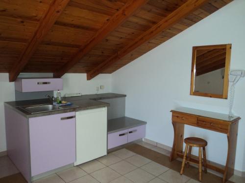 Kjøkken eller kjøkkenkrok på Paraschou Guesthouse