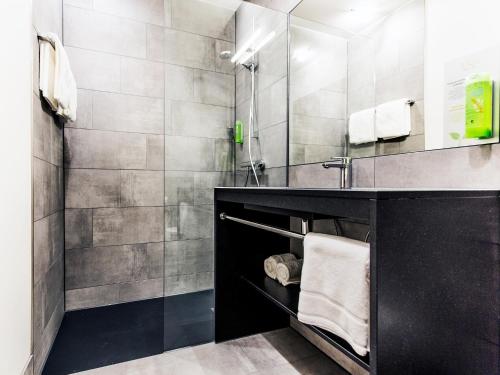 Koupelna v ubytování RiKu HOTEL Ulm