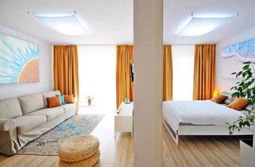 Posteľ alebo postele v izbe v ubytovaní Apartamenty REZULAK Solna B104 204 303