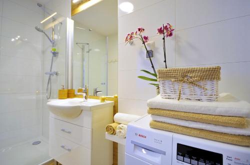Kúpeľňa v ubytovaní Apartamenty REZULAK Solna B104 204 303