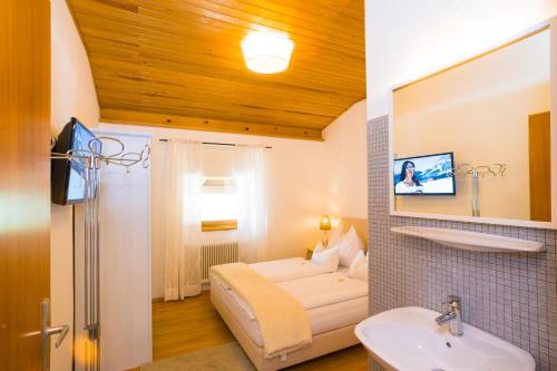 Posteľ alebo postele v izbe v ubytovaní Rodlers Chalet