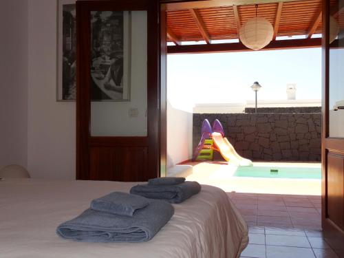 Postel nebo postele na pokoji v ubytování Happy Villa con piscina privada