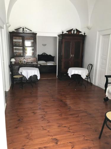 Ένα ή περισσότερα κρεβάτια σε δωμάτιο στο Marcos Rooms