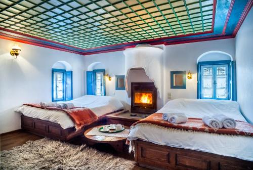 Postel nebo postele na pokoji v ubytování Guesthouse Ioannidis