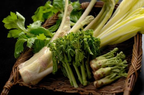 a basket filled with broccoli and celery on a table at Shouhakutei Azumaso in Tendo