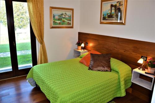 Postel nebo postele na pokoji v ubytování B&B Madonna Carradori