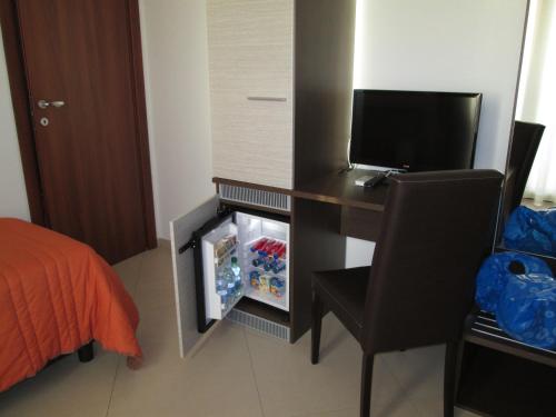 Μια τηλεόραση ή/και κέντρο ψυχαγωγίας στο B&B Elisir