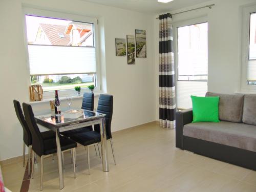 Posezení v ubytování Apartament Białe Piaski