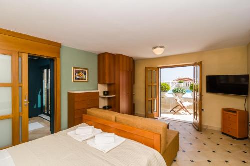 Postel nebo postele na pokoji v ubytování Studio apartment Antica