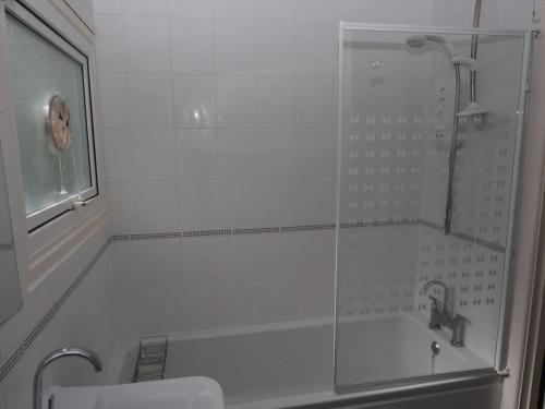 a bathroom with a shower and a sink at Villa 44 in Camelford