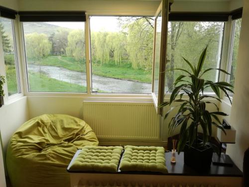 Posezení v ubytování Green Apartment