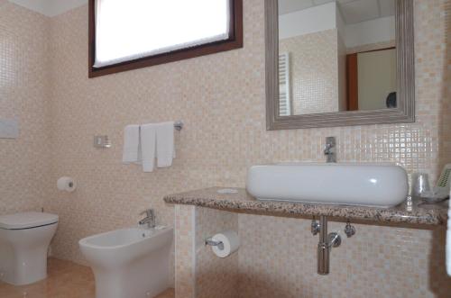 Koupelna v ubytování Hotel Magnolia