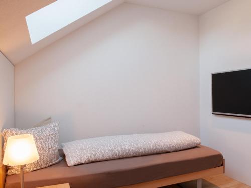 Ein Bett oder Betten in einem Zimmer der Unterkunft Gasthof Storchen