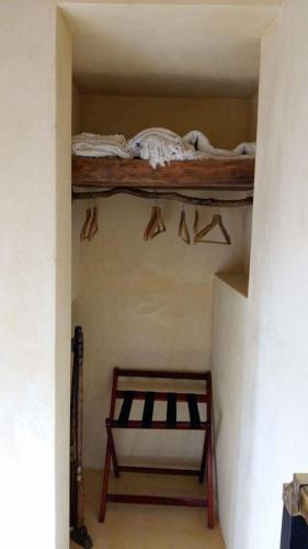 a room with two bunk beds on the wall at Kritikies in Pitsidia