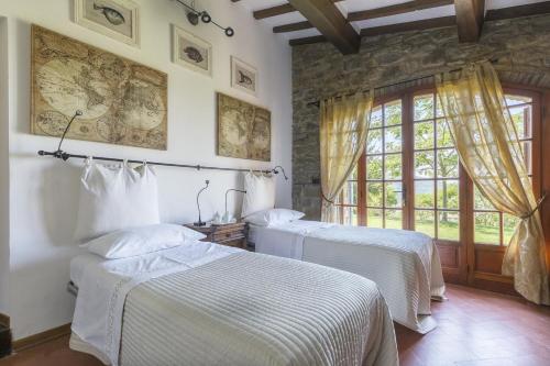 Cama o camas de una habitación en Villa ai Cedri