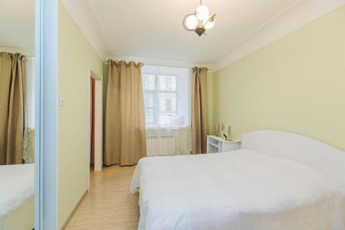 
Кровать или кровати в номере Апартаменты Мошков 
