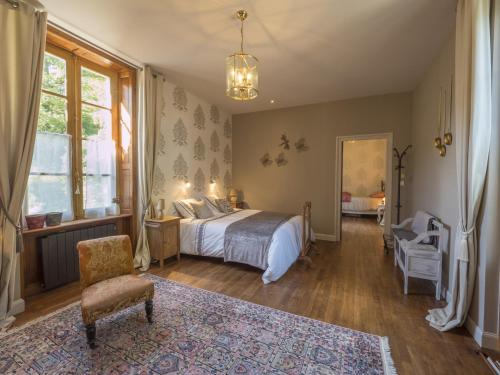 Postel nebo postele na pokoji v ubytování Manoir Tregont Mab