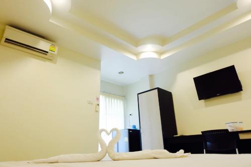 TV a/nebo společenská místnost v ubytování Better Place Hotel
