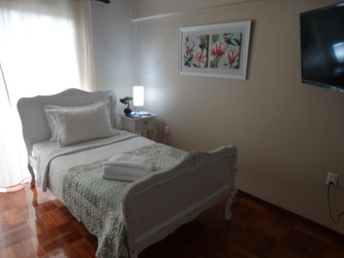 Ένα ή περισσότερα κρεβάτια σε δωμάτιο στο Hostal Pehuenche