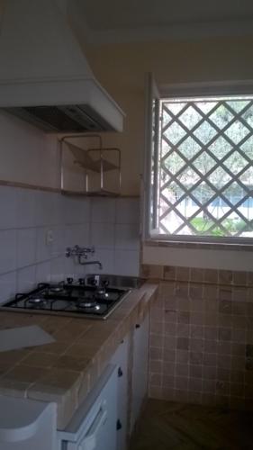 A kitchen or kitchenette at Cà del borgo Historic Village