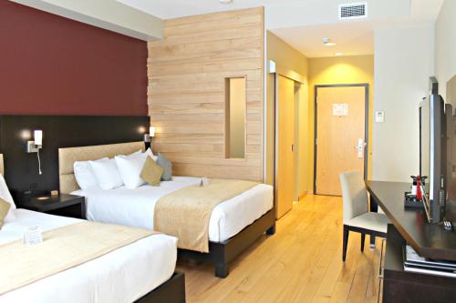 Кровать или кровати в номере Moulin Wakefield Mill Hotel & Spa