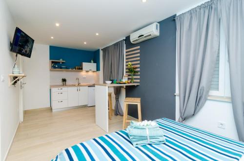 Η κουζίνα ή μικρή κουζίνα στο Apartments Zore Glavinić