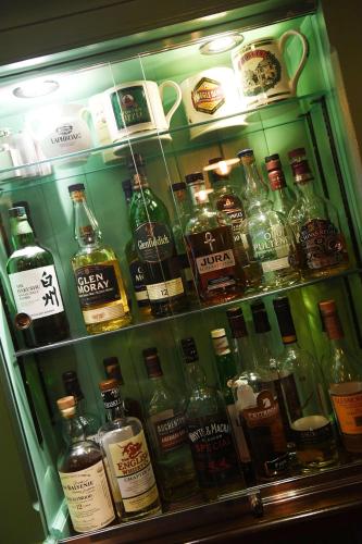 a refrigerator filled with lots of bottles of alcohol at Battlesteads in Wark