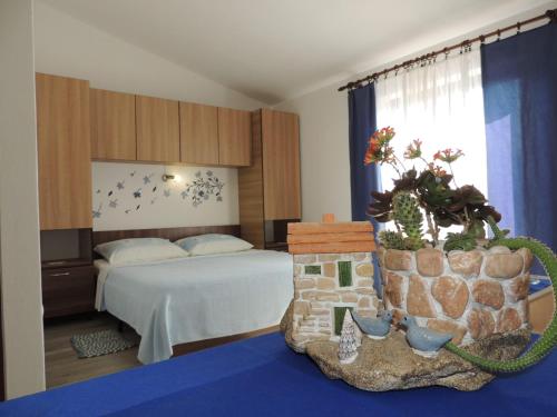 Postel nebo postele na pokoji v ubytování Apartments Barcarola