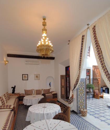 Llit o llits en una habitació de Riad Souafine