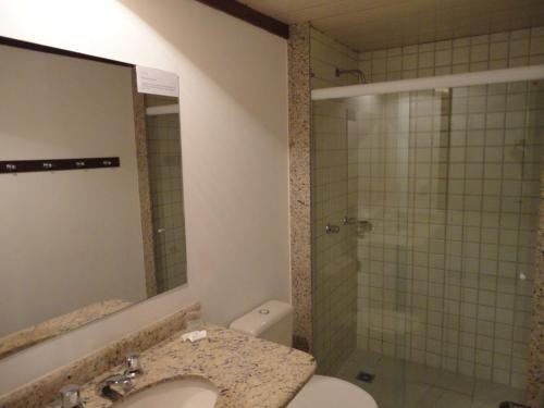 Um banheiro em Pisa Plaza Hotel
