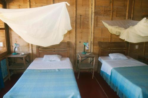 Grillo Tres Puntas Eco-Hostelにあるベッド