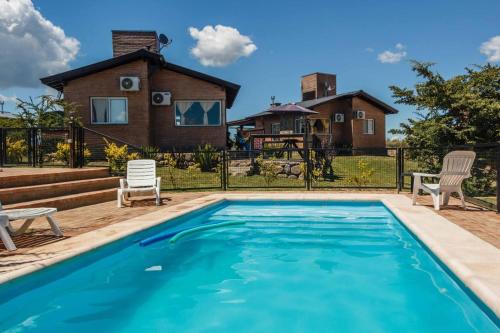 Bazén v ubytování Cabañas & Suites Vista Hermosa nebo v jeho okolí