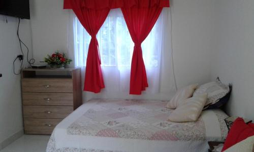 A bed or beds in a room at Miss Margaritas´s House
