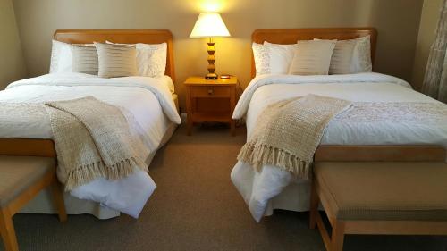 Postel nebo postele na pokoji v ubytování Starlight Lodge Cape Cod