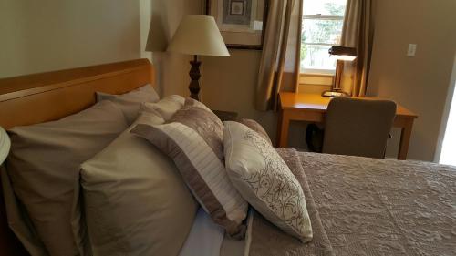 Ένα ή περισσότερα κρεβάτια σε δωμάτιο στο Starlight Lodge Cape Cod