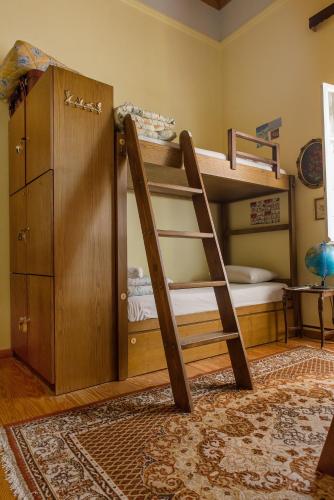 Una cama o camas en una habitación de Athens Quinta